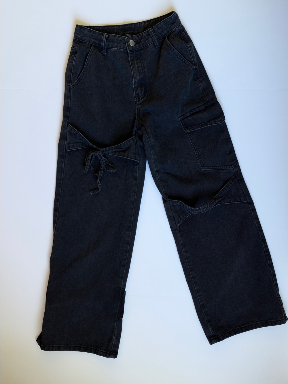 Cider washed black denim relaxed fit cargo jeans with tie bow accent